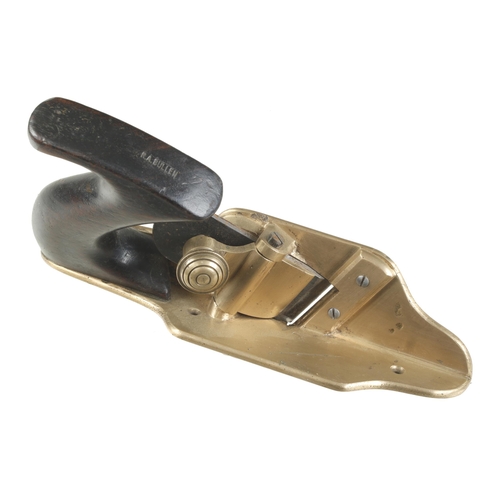 379 - A brass shouldering plane with ebonised handle G+