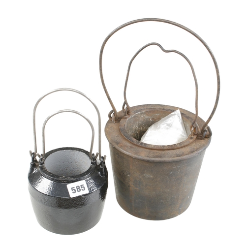 585 - Two cast iron glue pots G+