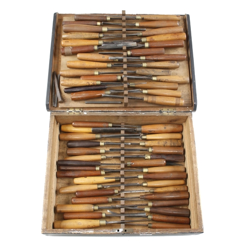 A working kit of 52 carving tools in pine box and 4 decorative punches G+