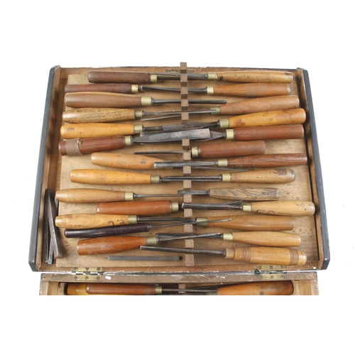 A working kit of 52 carving tools in pine box and 4 decorative punches G+