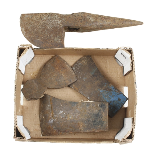 684 - An unusual heavy axe type tool and 3 axe heads G