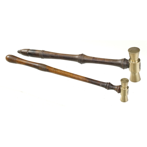 874 - An early pair of brass hammers the heads 1 1/2