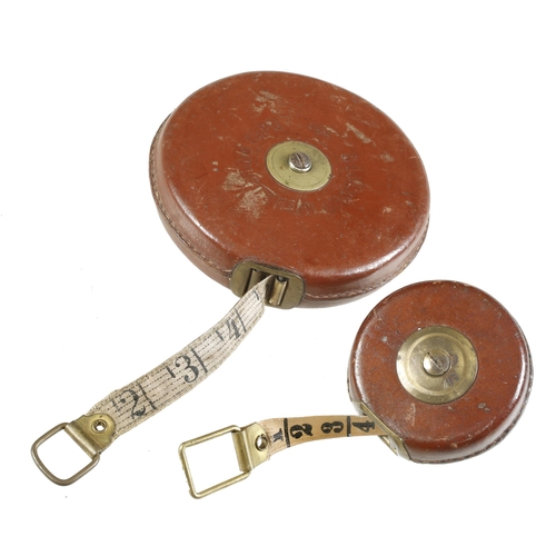 880 - Two leather cased measuring tapes 66' with Railway Measuring Tape with Links and Poles on the revers... 