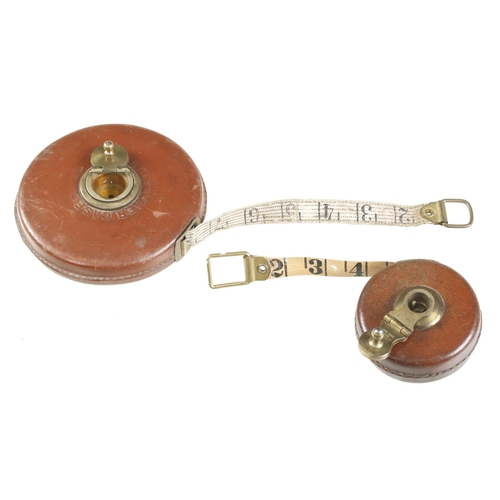 880 - Two leather cased measuring tapes 66' with Railway Measuring Tape with Links and Poles on the revers... 