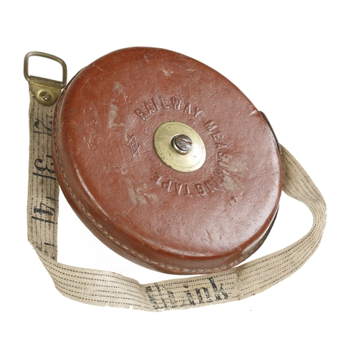 880 - Two leather cased measuring tapes 66' with Railway Measuring Tape with Links and Poles on the revers... 