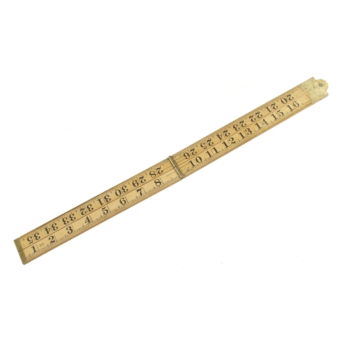 882 - A probably unused 3' four fold RABONE No 1167 boxwood and brass braille rule F