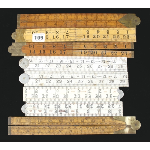 109 - Two 4 fold and two 2 fold boxwood rules and 4 plastic rules G