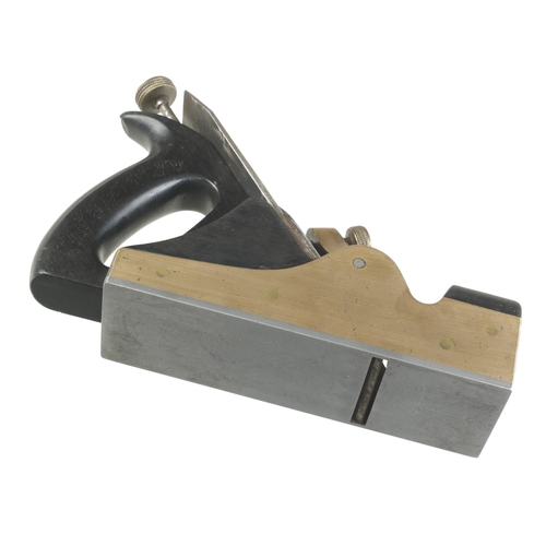 152 - A craftsman made steel soled adjustable brass smoother with ebony infills and handle G+