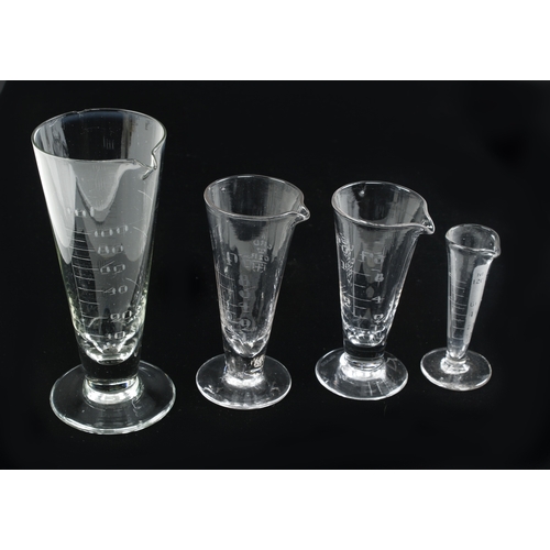 621 - A collection of 7 conical glass Imperial and Metric  measures 120ml to 500ml, tiny chip to one o/w F