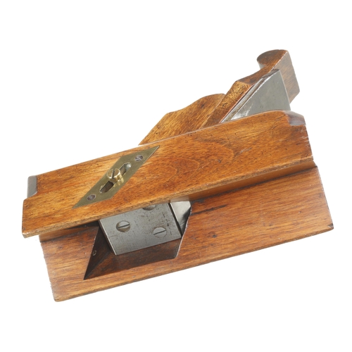 724 - A quality, polished ash sliding box type chamfer plane with brass fitting and scrolled wedge F