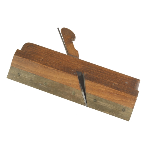 752 - An unusual brass soled moulding plane by BUDD London G++