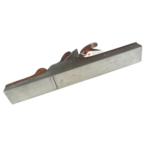 876 - A nice quality iron jointer with shapely overstuffed mahogany infill and handle and semi-scrolled we... 