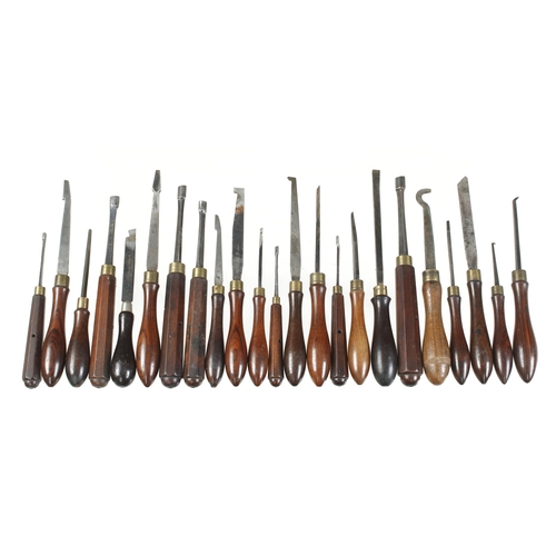 913 - 58 rosewood handled ornamental turning tools, 31 named HOLTZAPPFEL the rest matching and probably mo... 