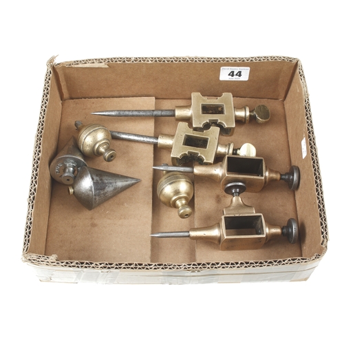 44 - Four plumb bobs and two pairs of brass trammels with steel points G+