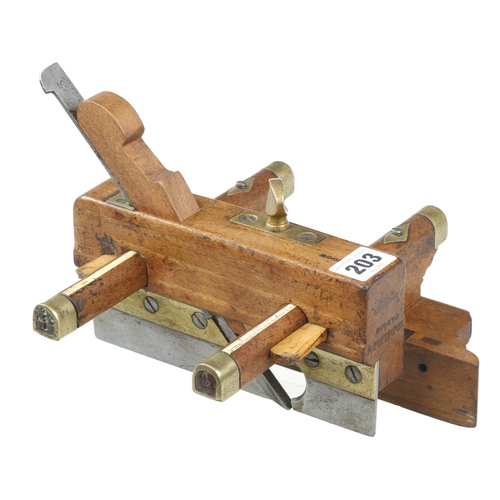 203 - A beech plough by MOSELEY with removeable skate and fence for circular work, decorative brass plates... 