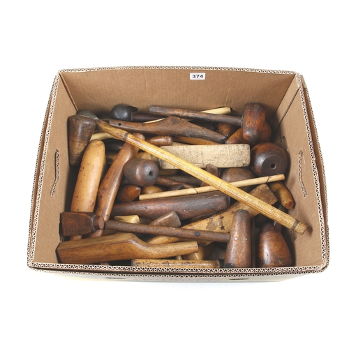 374 - A large selection of 50 boxwood and lignum plumber's bossing mallets, dressing wedges, bobbins etc G... 