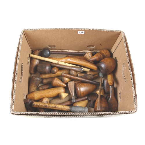 374 - A large selection of 50 boxwood and lignum plumber's bossing mallets, dressing wedges, bobbins etc G... 