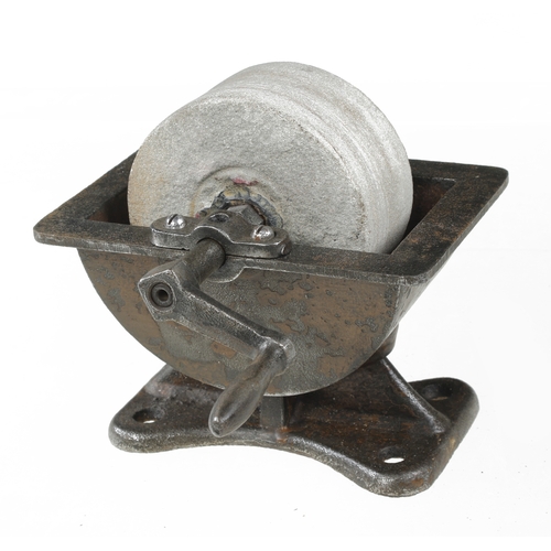 457 - A small sandstone sharpening wheel in cast iron  water bath G+