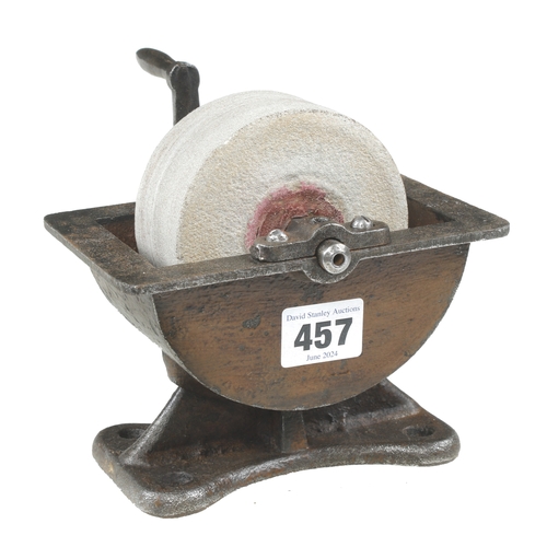 457 - A small sandstone sharpening wheel in cast iron  water bath G+