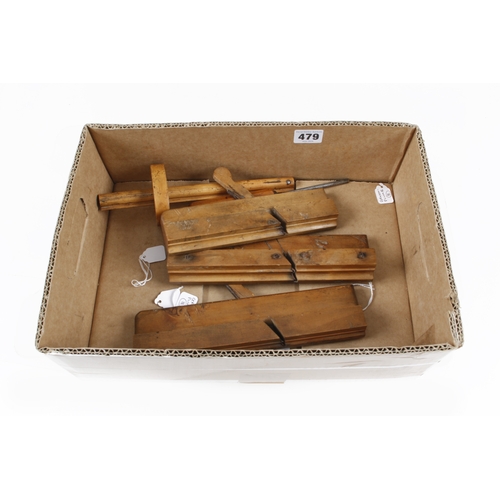 479 - Three small moulding planes, a carving chisel and an unusual marking gauge all in boxwood G+