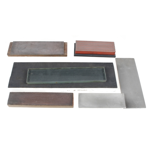 481 - Three diamond and a ceramic sharpening stones, 2 leather stops and a glass lapping plate G