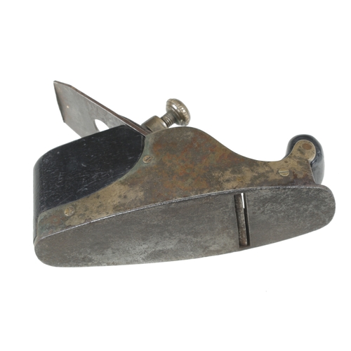 908 - A rare steel soled brass coffin smoother with rosewood infill and pierced brass lever (appears to be... 