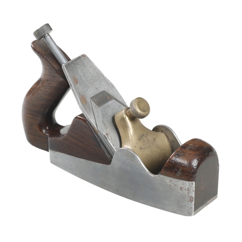 965 - A d/t steel NORRIS A2 adjustable smoother with rosewood infill and open handle, one inch remains of ... 