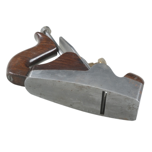 965 - A d/t steel NORRIS A2 adjustable smoother with rosewood infill and open handle, one inch remains of ... 