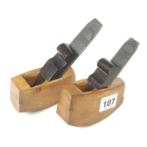 107 - A pair of craftsman made beech compass planes with flat and round soles and ebony wedges G++