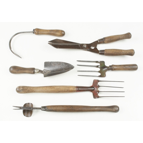 128 - Six vintage garden tools G