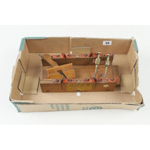 35 - An adjustable mitre box, a pair of 4