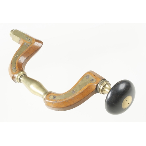 940 - A brass plated button pad beech brace with brass handle and ebony head, lacks one screw o/w G