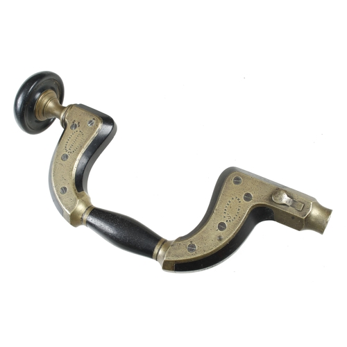 944 - A brass framed lever pad ebony brace by MARSDEN Bros Sheffield with The Improved Brace , the head wi... 