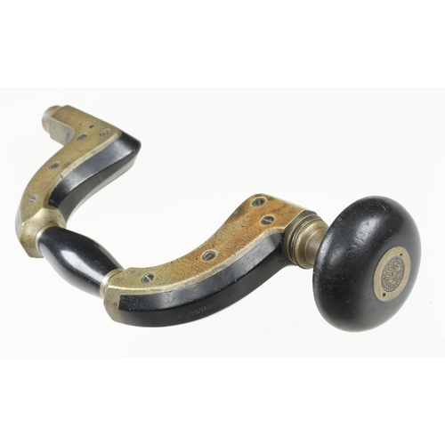 944 - A brass framed lever pad ebony brace by MARSDEN Bros Sheffield with The Improved Brace , the head wi... 