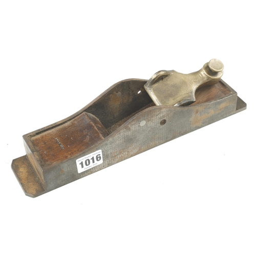 1016 - An iron mitre plane and a separate brass lever for restoration G