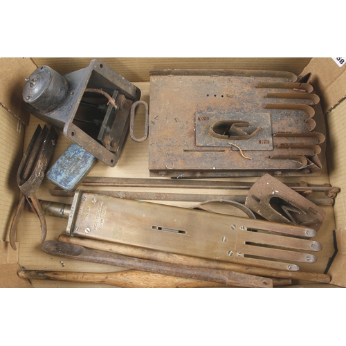 1058 - A rare glovemakers tool kit incl. an electric brass laying out hand, templates, scissors, stretchers... 