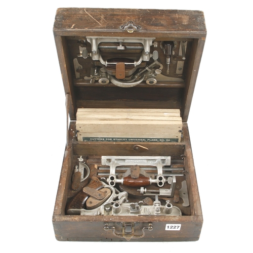 1227 - A little used STANLEY No 55 combination plane complete with every part securely fitted in owner made... 