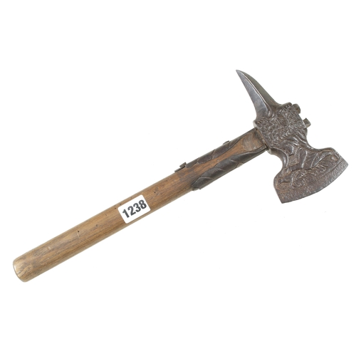 1238 - An important decorative 18c German strapped hand axe, the head in the form of an eagle, the 3 1/2