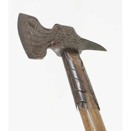 1238 - An important decorative 18c German strapped hand axe, the head in the form of an eagle, the 3 1/2