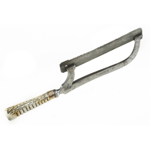 1285 - A small Lancashire pattern hack saw with decorative bone handle and 5