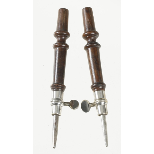 1385 - A pair of most unusual, nice quality extending steel pointers with plated brass ferrules and shapely... 