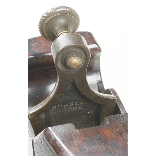 1594 - An iron parallel smoother marked BUCK on the lever but NORRIS London inside the lever, obviously pro... 