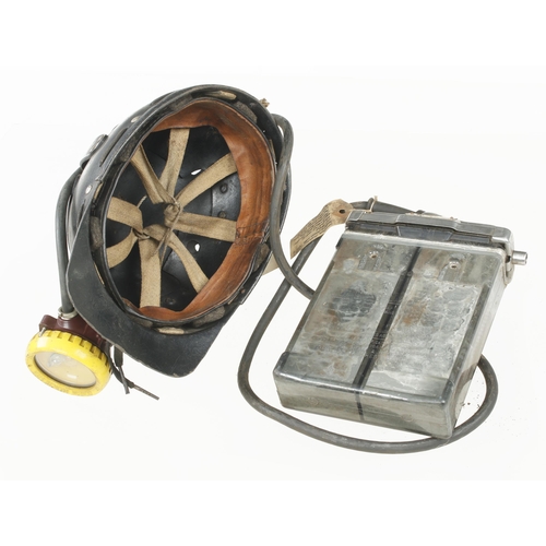 18 - A miner's safety helmet with battery pack G