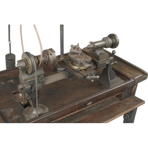 626 - A jeweller's/engineer's two footed treadle lathe with overhead gear and integral seat with numerous ... 