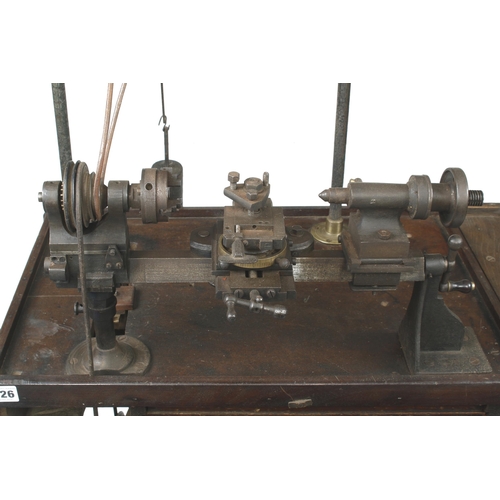 626 - A jeweller's/engineer's two footed treadle lathe with overhead gear and integral seat with numerous ... 