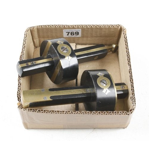 769 - Two ebony and brass mortice gauges by MATHIESON G+