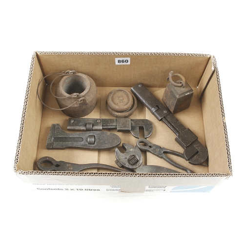 860 - A small iron glue pot, 6 wrenches and 3 weights G