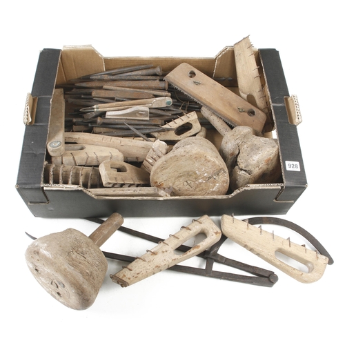 928 - A kit of stonemason's tools comprising mallets, floats and numerous chisels G