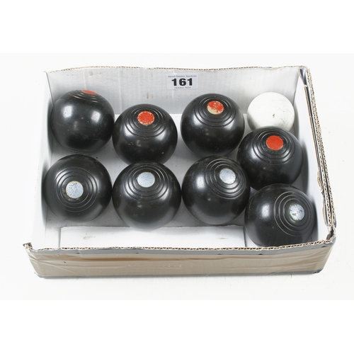 161 - A set of 8 BANDA No2 carpet bowls and a jack G+