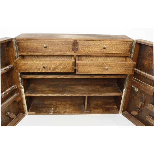 379 - A large oak wall mounting tool cabinet 30